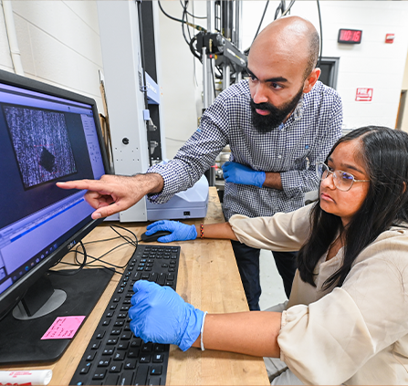 Photo of people in a lab. Link to What to Give.